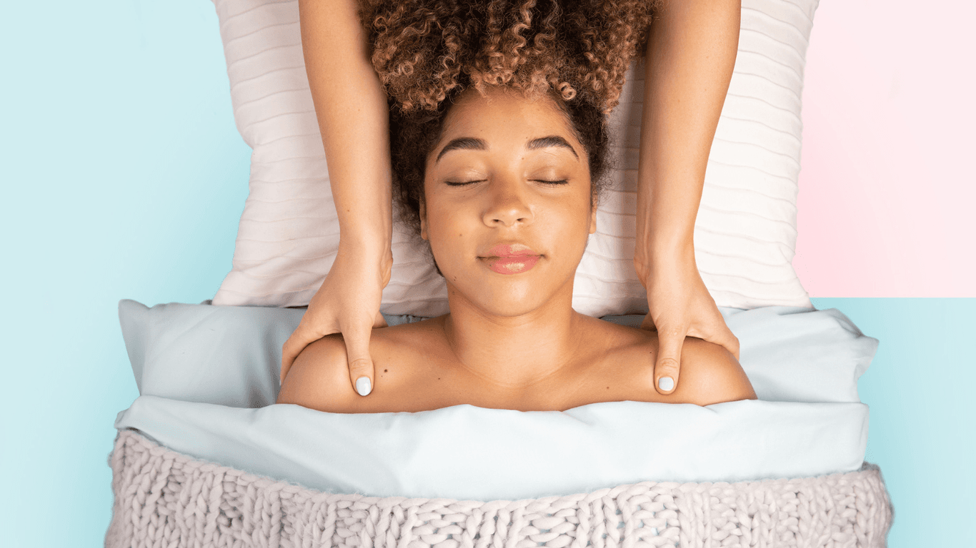 A guest having a massage at a Squeeze shop